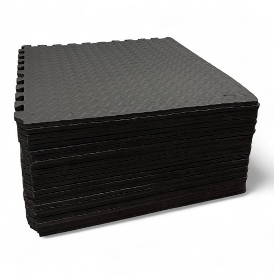 Interlocking rubber gym flooring tiles for a home garage gym